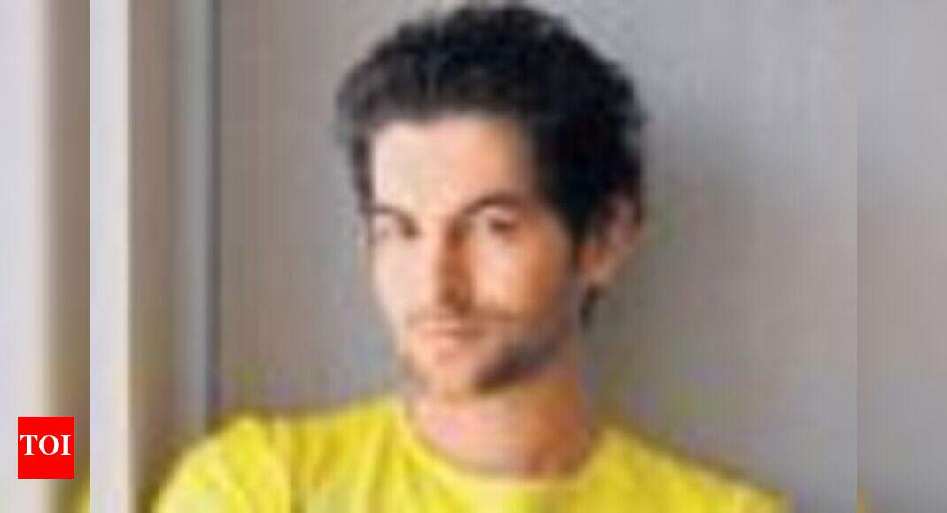 Neil gets bizarre over car! | Hindi Movie News - Times of India