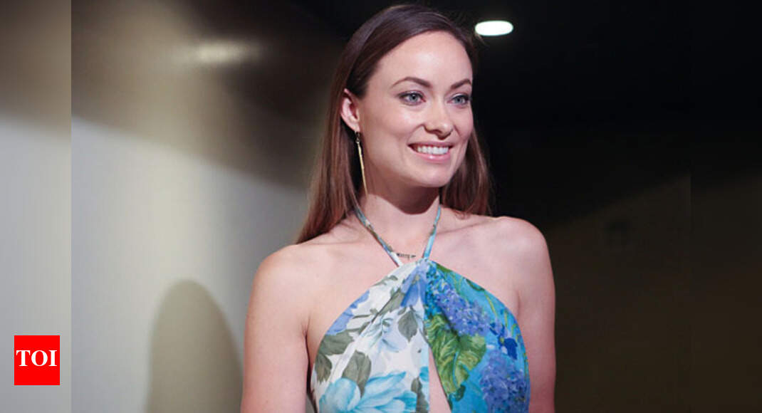 Olivia Wilde credits Kanye West for son's good sense of rhythm(02)