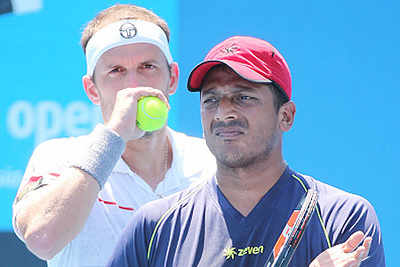 Bhupathi moves to second round but Paes out of Australian Open