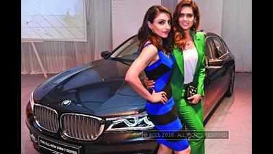 Soha Ali Khan and Easha Gupta unveil BMW 7 series at the Delhi Auto Expo in Greater Noida
