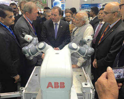 PM Modi meets robot YuMi at 'Make in India' event