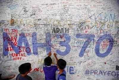 MH370 families issue emotional plea for open-ended search