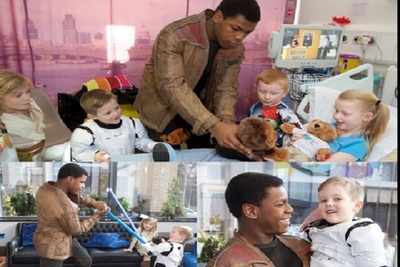 John Boyega surprises sick children with 'Star Wars' toys
