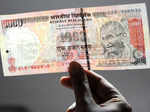 Rupee gains 38 paise against dollar