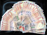Rupee gains 38 paise against dollar