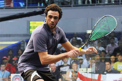 Ashour saves match point to make British Open last-eight
