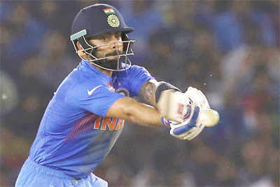 Kohli epic sees India through to World T20 semi-final