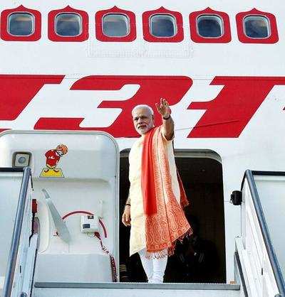 Modi travels by night, sleeps on flights to save time