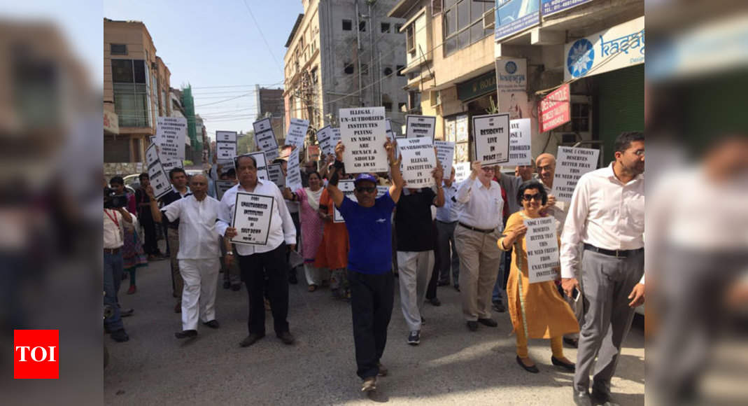 Delhi's South-ex residents hold protest march against coaching