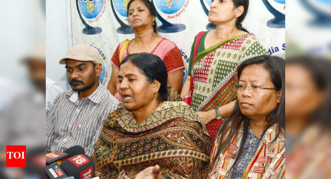 Rohith's mom and brother to embrace Buddhism | India News - Times of India