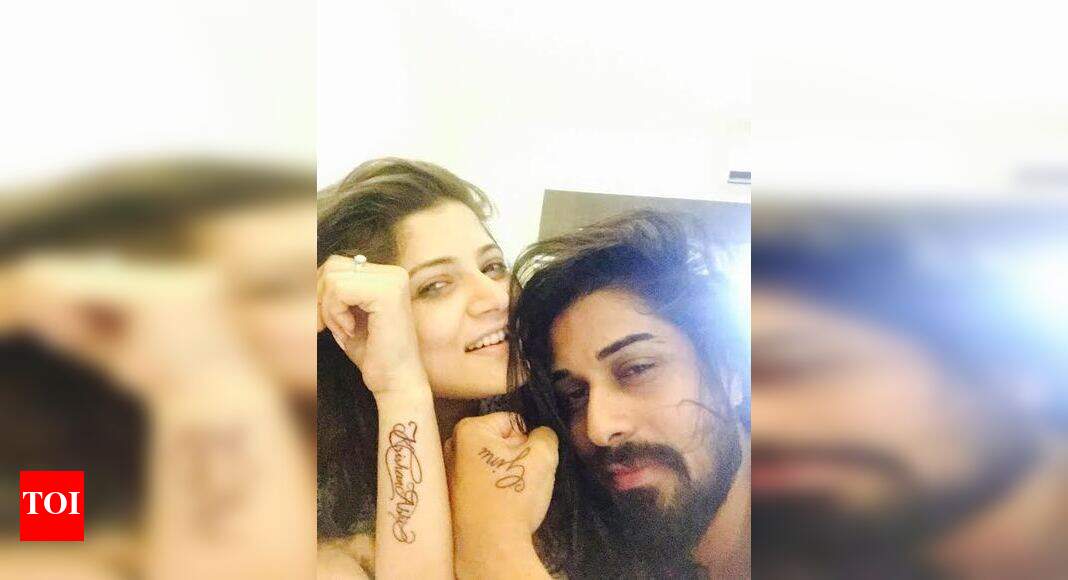 Srabanti Krishan Tattoo Each Other S Names On Wrists Bengali Movie News Times Of India Srabanti Krishan Tattoo Each Other S Names On Wrists Bengali Movie News Times Of India