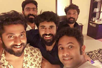 Aju's selfie with four bearded men