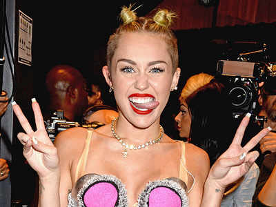 Miley Cyrus working with rock duo Stepfather