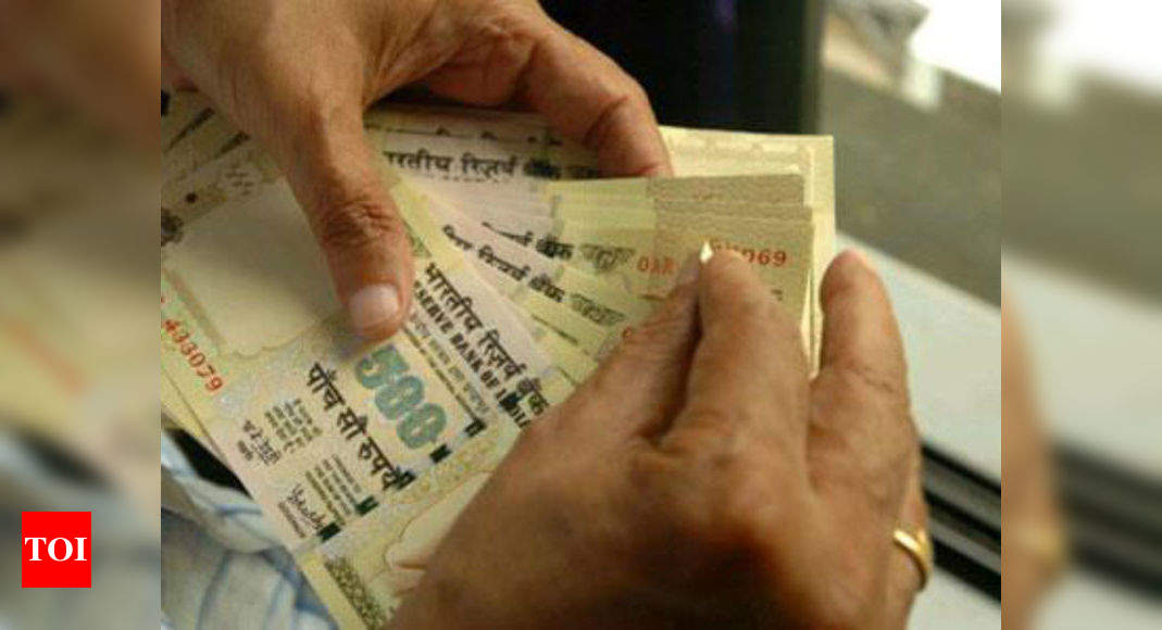 Rupee slips 10 paise to 67.26 on dollar demand - Times of India