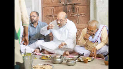 Eye on UP polls, Shah dines at Dalit home