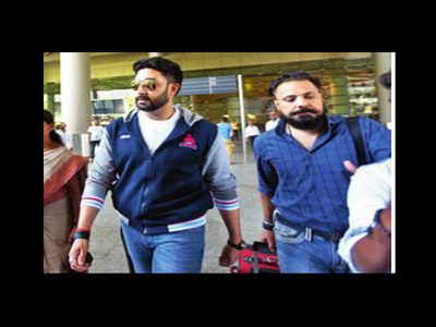 Abhishek Bachchan and Bunty Walia spotted outside the airport