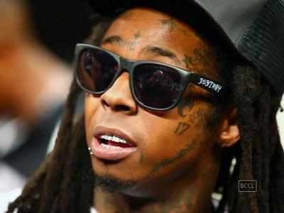 Lil Wayne returns to stage two days after seizure scare