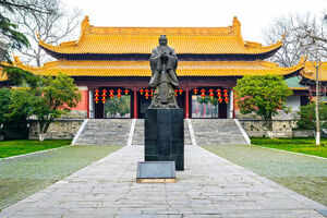 Relax under centuries old cypress trees at Confucius Temple