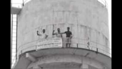 Unemployed youths climb water tank in Badal village