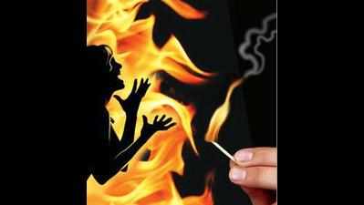 Woman sets herself, two kids ablaze