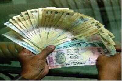 Rupee declines 10 paise against dollar