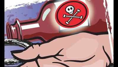 Pesticide kills rlys staffer, teenage son