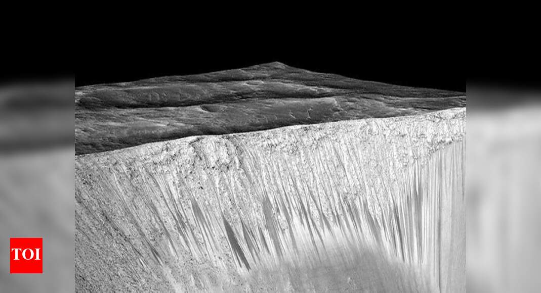 Mars dark streaks on mars may indicate flowing water study times of
