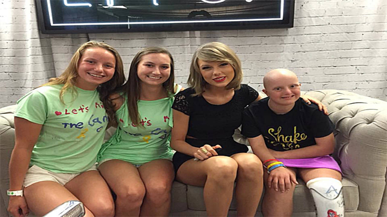 Taylor Swift brightens up children's day with visit to sick kids