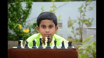 This lil' cancer survivor is now a chess champ