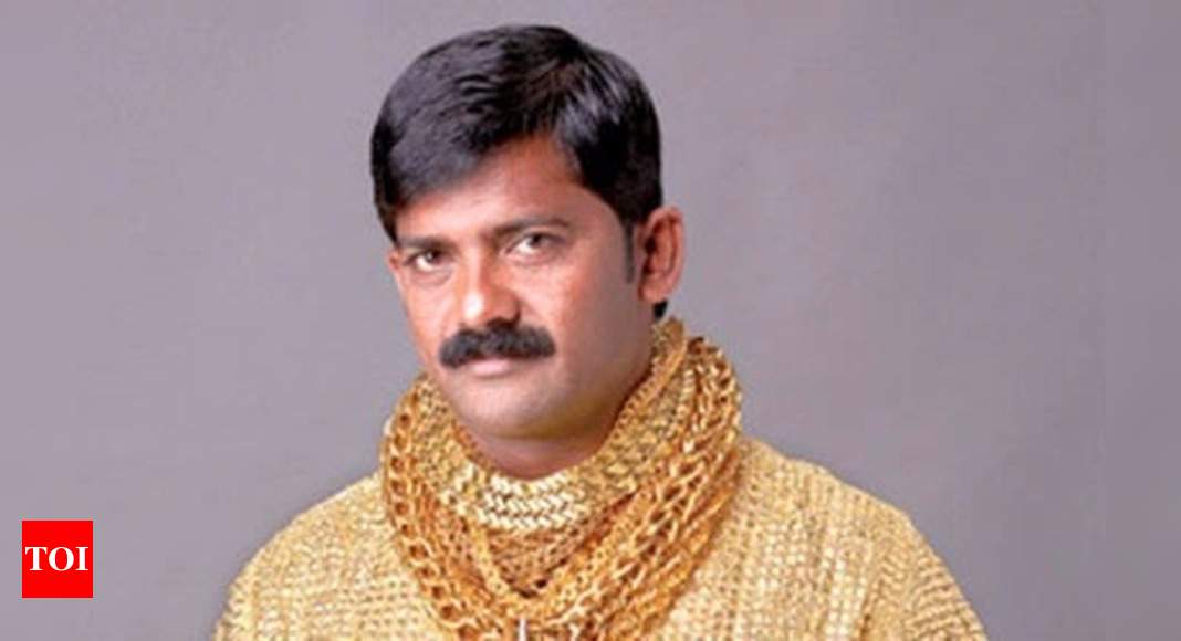 indian guy gold shirt
