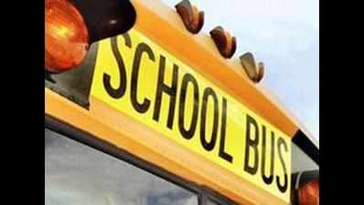 Man injured as school bus collides with car