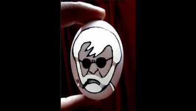 Carving Thalaiva on an egg shell
