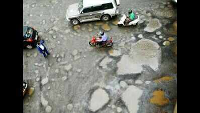 Princess and Frog artwork gets potholes fixed in Bengaluru | Bengaluru ...