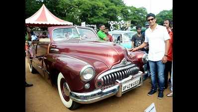Jiiva strikes a pose for the shutterbugs at the vintage car and bike rally at ​​Don Bosco School, Chennai