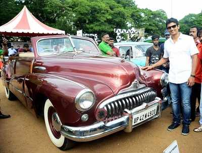 Jiiva strikes a pose for the shutterbugs at the vintage car and bike rally at ​​Don Bosco School, Chennai