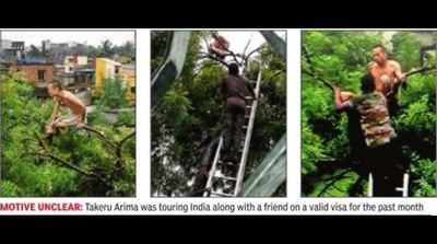 9-hr ordeal to rescue Japanese from treetop