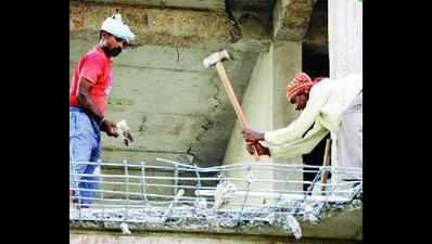 Labourers razing illegal bldg face threats