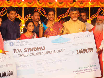 Sindhu receives Rs 3 crore cheque from Andhra Pradesh government