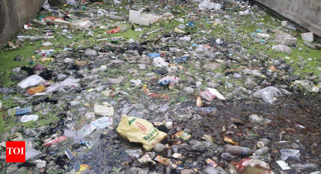 Velachery storm drain choked by plastic Times of India