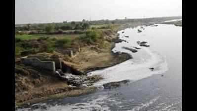 'Waste from flat complex goes into river'
