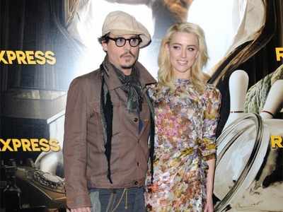Amber Heard, Johnny Depp argue over divorce settlement donation