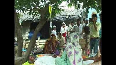 Attached to drips on trees in open air, patients battle fever in UP's hinterland