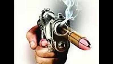 Gunman shoots wife, held