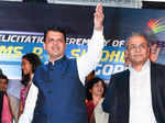 Maharashtra CM felicitates PV Sindhu, P Gopichand