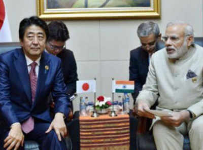 PM Modi meets Shinzo Abe in Laos