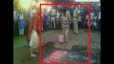 Watch: Two IPS officers walk on burning charcoal to create awareness