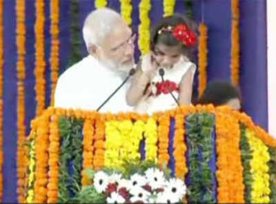 Specially-abled girl reads from Ramayana as PM Modi holds her in his arms