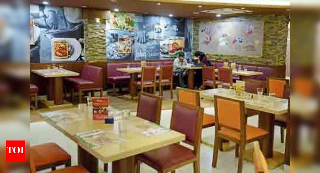 AMC Pin found in food, AMC seals restaurant Ahmedabad News Times
