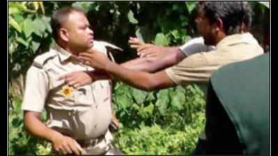 Cop attacked over garbage dumping