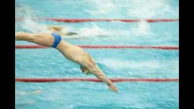Seven-year-old breaks longest swim record